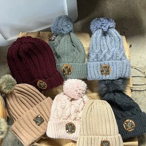 pom pom beanie, luxury emblem, fur lined winter hat, warm cozy, snow, fashion